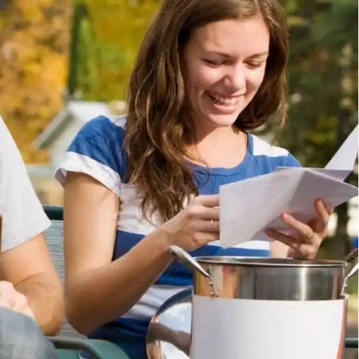 A portable fondue pot with a colorful base.