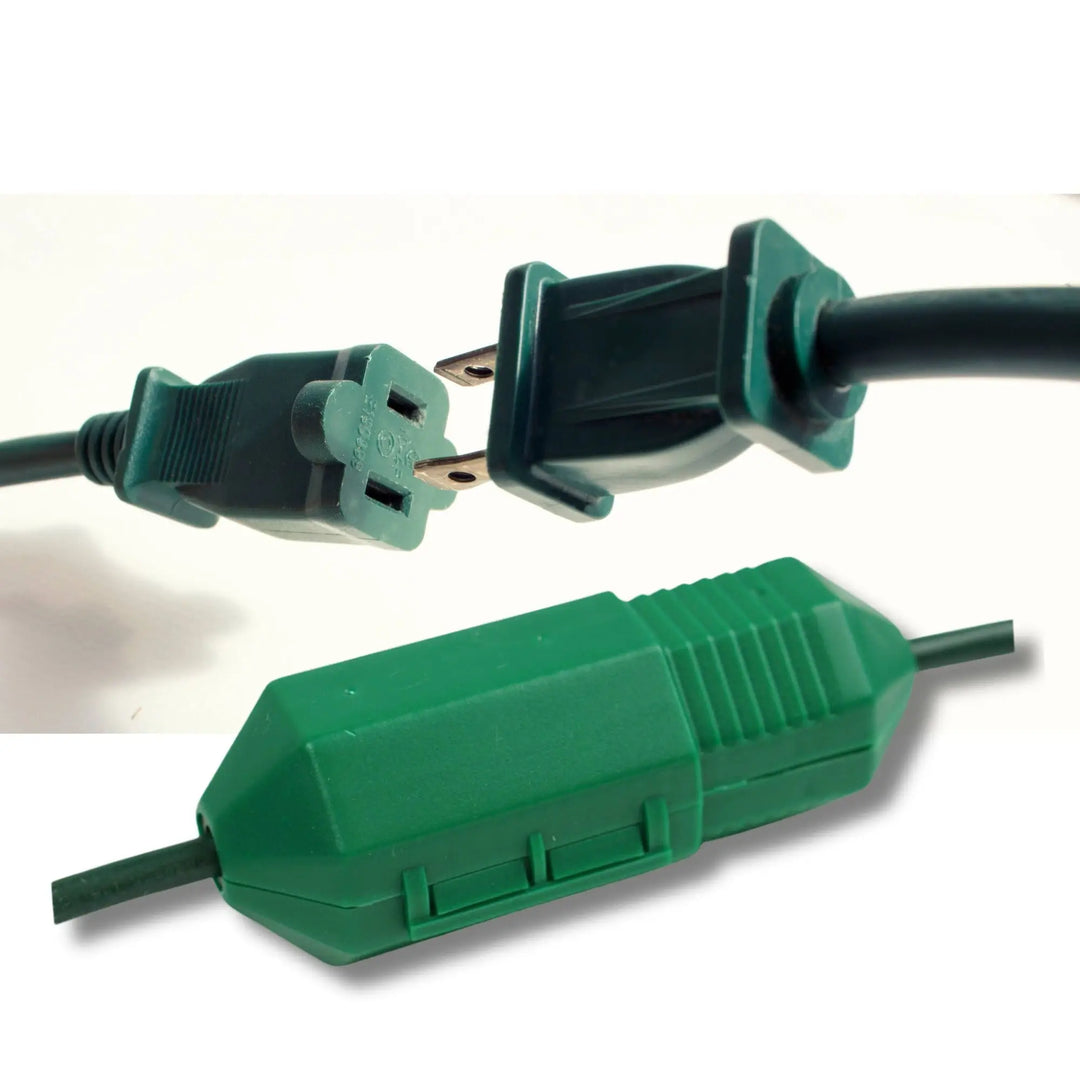 Green plastic extension cord with built-in switch and two plugs