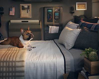 Truck driver with dog in semi truck cab using Travel Trable cup holder food tray