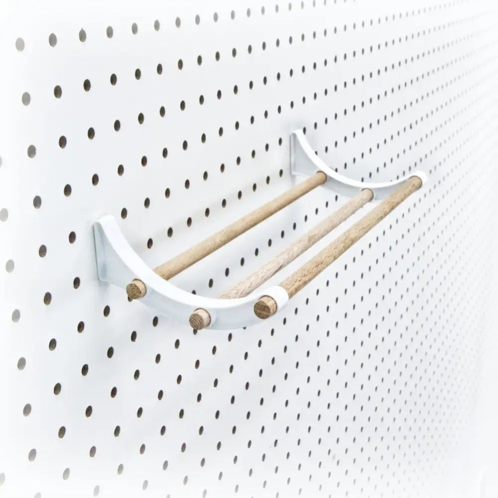 Peggy pegboard organizer 12-inch kit keeping craft ribbon, tape, and wire neatly stored and accessible in a craft room, Made in USA