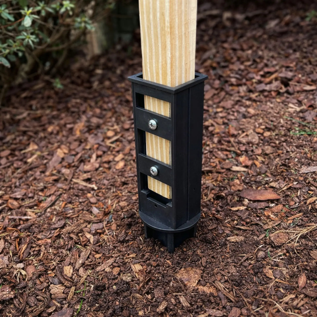 Stake It ground anchor mounted with 2x4 wooden post for stable garden trellis structure
