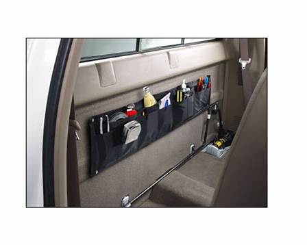 Black fabric car organizer with pockets for Fred Lososs road life items