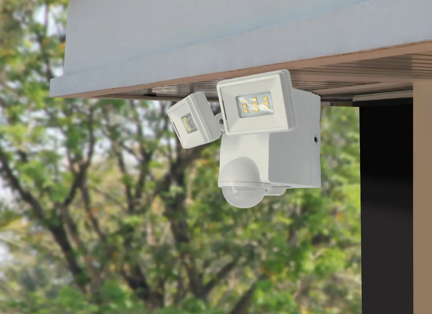 White outdoor motion-sensor spotlight with adjustable LED heads