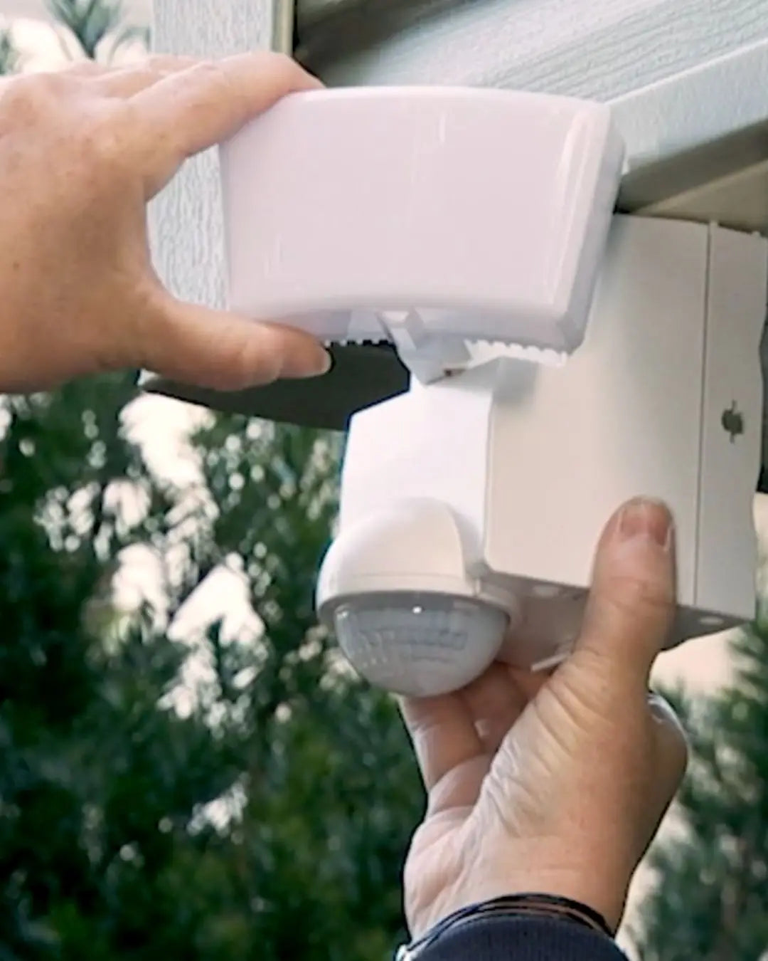 IQ America motion security lights displayed in a clean product scene | IQ America product detail close-up showing build quality | Lifestyle photo featuring IQ America motion security lights in use