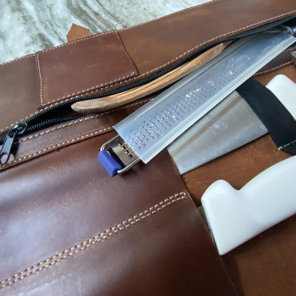 Image of Premium Product: Blade Guard Genuine Leather Chef S Knife Roll 4 Slot Knife Bag With Extra Storage For Professional Chefs Secure Durable And Stylish Travel Friendly Case, highlighting its features and quality.