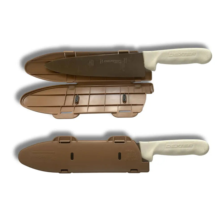 Dexter 10 inch chef’s knife with white handle and brown blade in tan plastic blade guard knife edge protector sheath