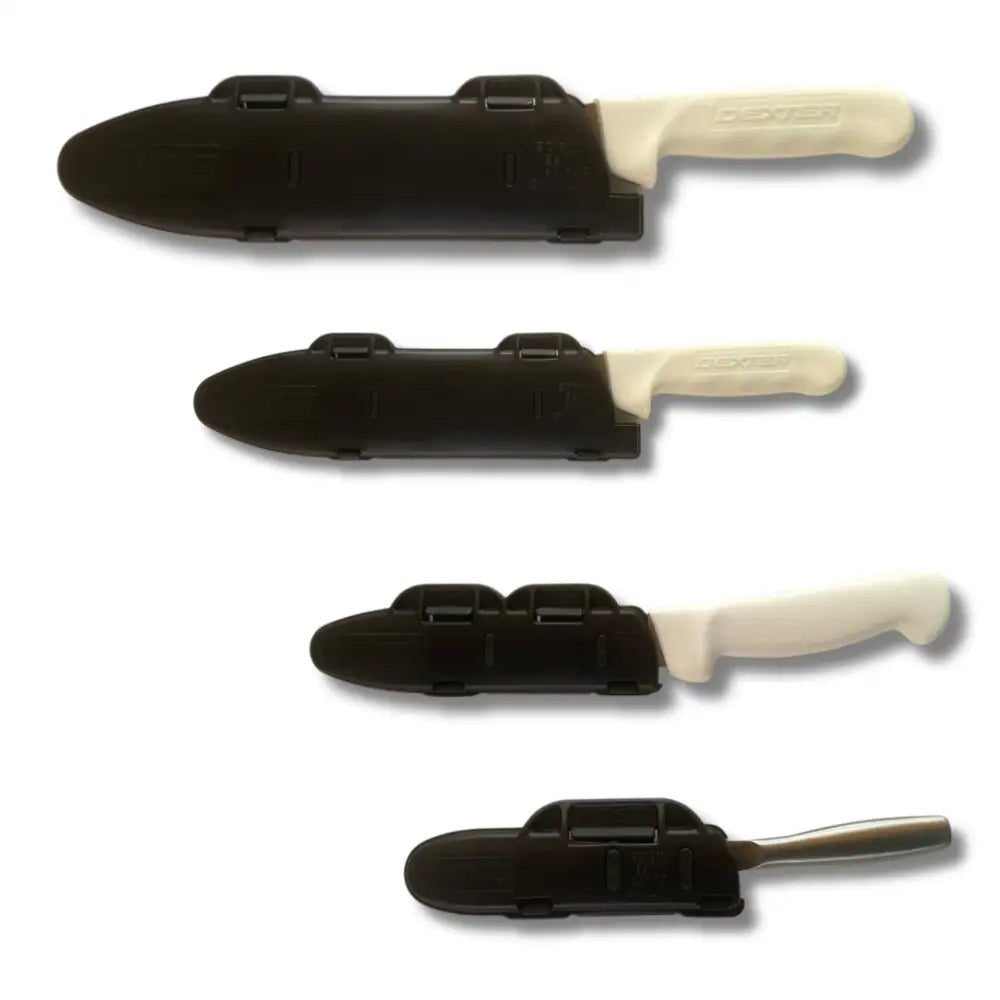 Set of four black plastic blade guards with white handles for knife edge protection in the Blade Guard™ chef’s knife set
