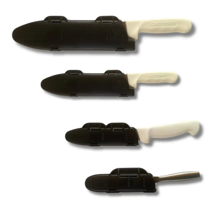 Set of four black plastic blade guards with white handles for knife edge protection in the Blade Guard™ chef’s knife set