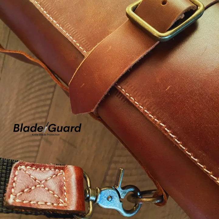 Brown leather knife sheath with brass buckle and stitched detailing for blade guard premium leather knife roll