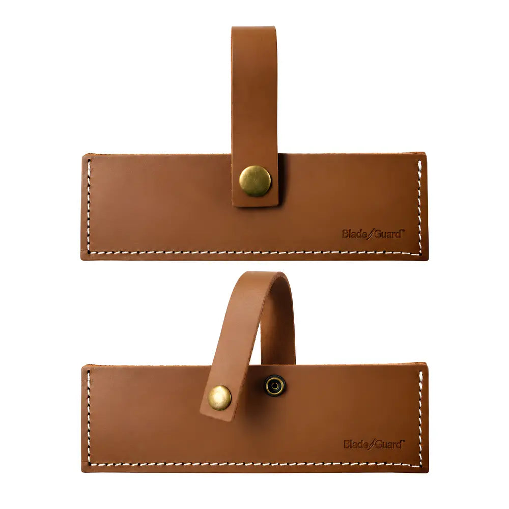 Blade Guard 6-inch brown leather ULU knife and bench scraper sheath, showing stitched edges and the retaining strap fastened and unfastened.
