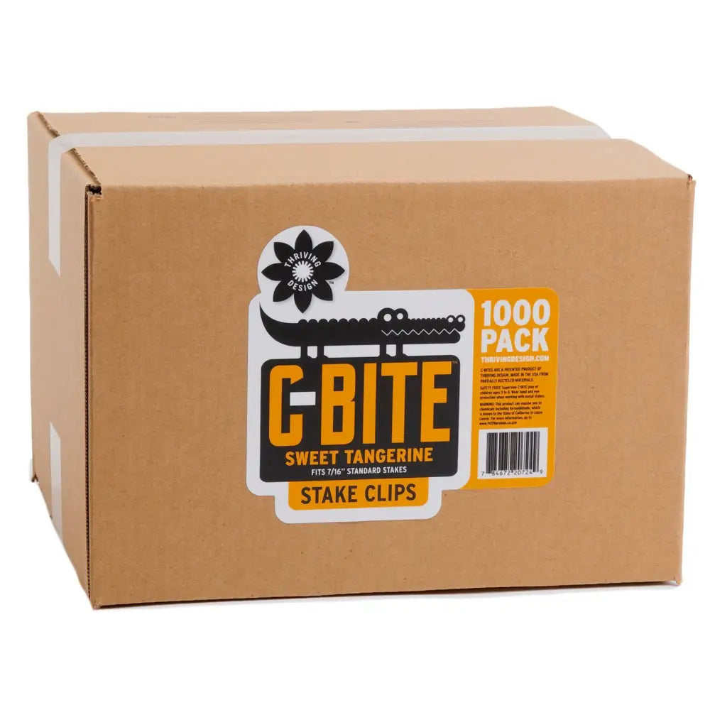Brown cardboard box of c-bite green plant support clips with flexible plant stake clips for garden stakes labeled with crocodile graphic