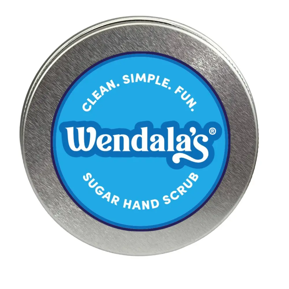 Wendala’s crab away-rosemary mint sugar hand scrub in a round metallic tin with a vibrant blue label and organic coconut