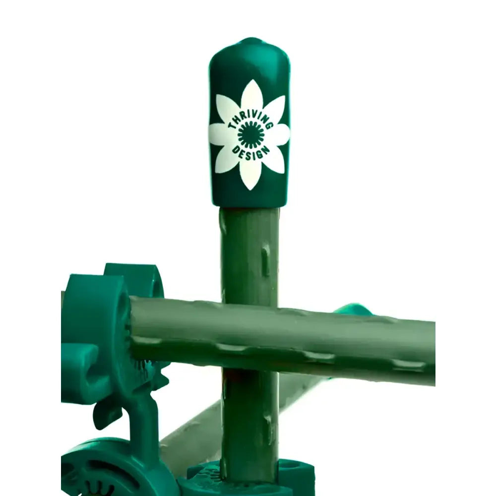 Green plastic garden stake with white flower logo and thriving design text for custom trellis monster garden plant support