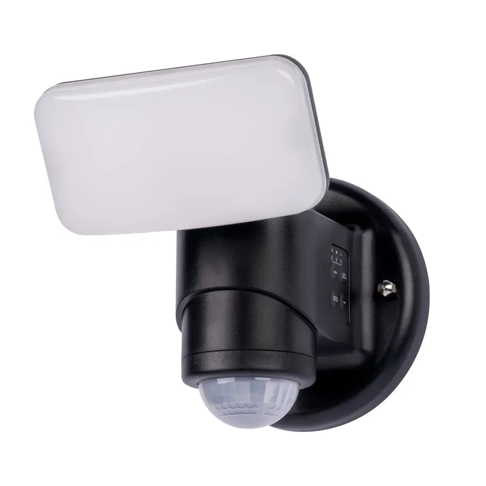 Dynamic tracking wired motion security light with black housing, white diffuser, circular sensor