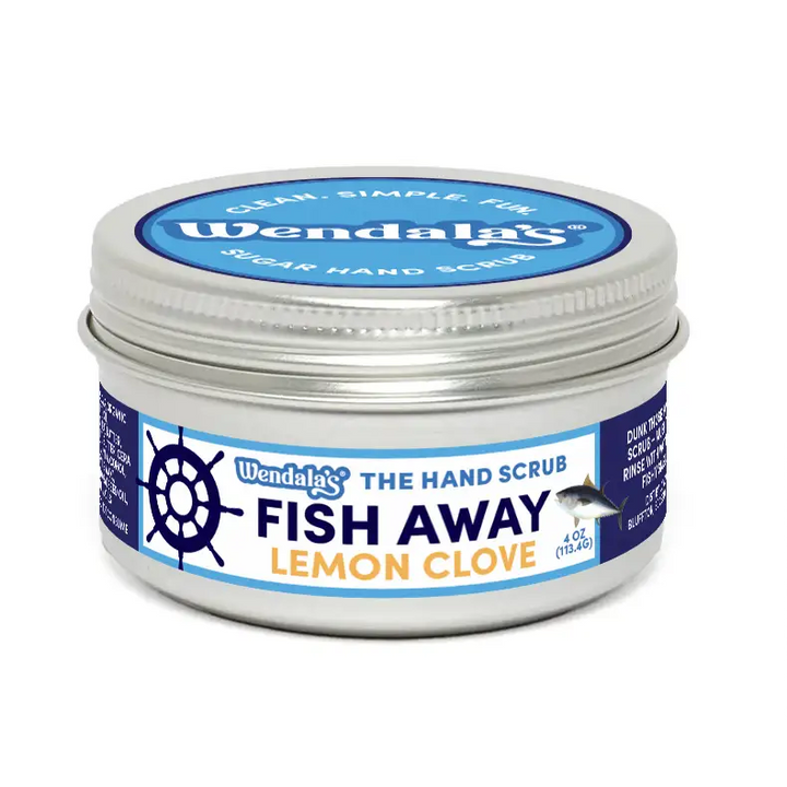 Wendalas fish away lemon clove sugar hand scrub in a silver tin with blue and white label leaves hands soft organic coconut