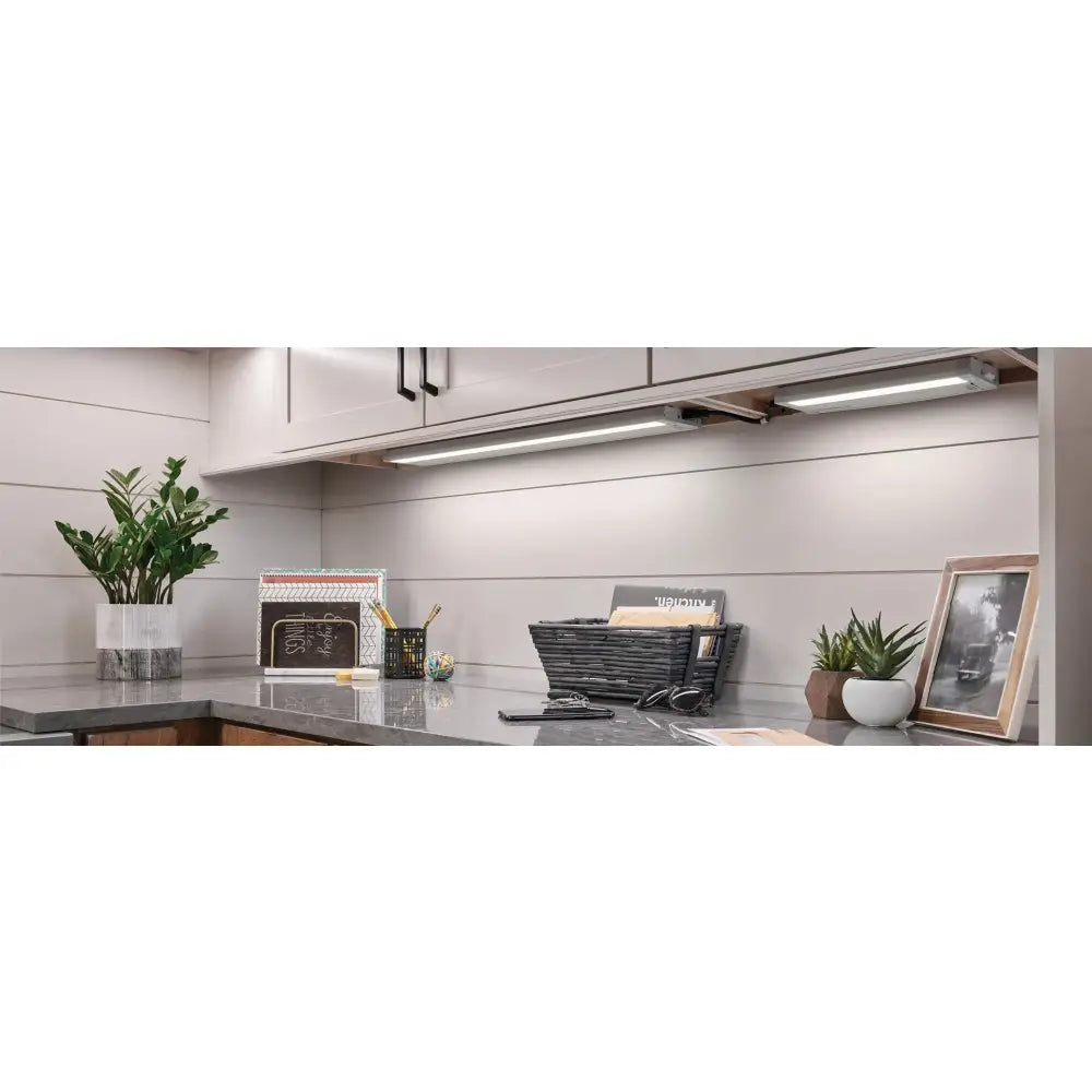 FLI Products 12 inch cabinet task light with slim metallic finish and integrated mounting brackets for closet light use