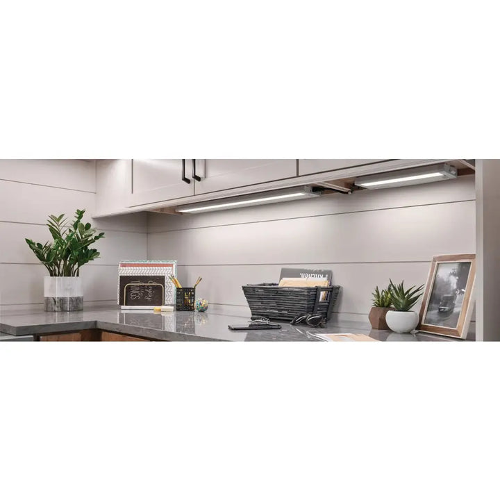 FLI Products 12 inch cabinet task light with slim metallic finish and integrated mounting brackets for closet light use