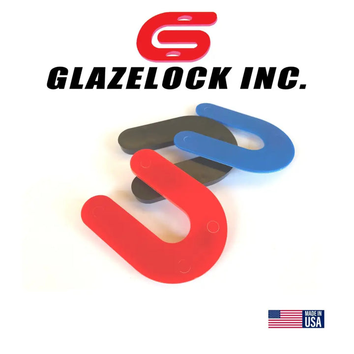 Three u-shaped glazelock shims in red blue and black with 2 by 1.5 inch size and 0.5 inch slot