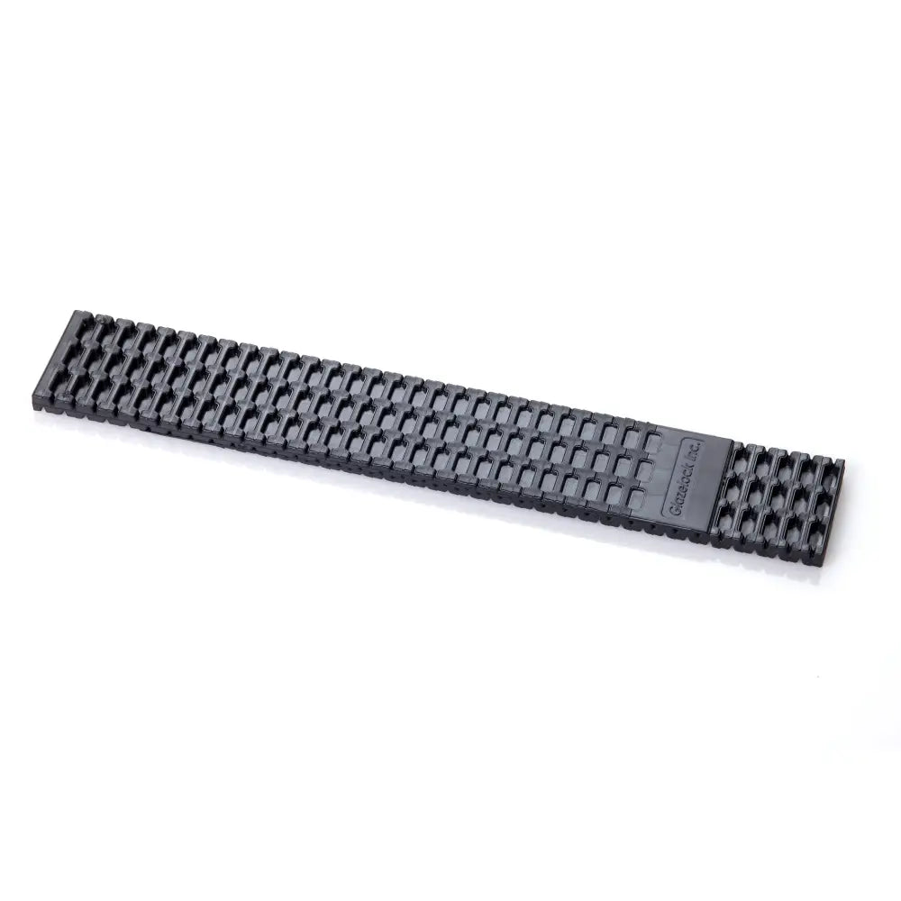 Black textured watch band with grid pattern and garrett engraving paired with glazelock shims plastic wedge
