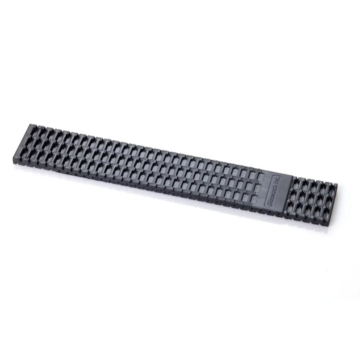 Black textured watch band with grid pattern and garrett engraving paired with glazelock shims plastic wedge