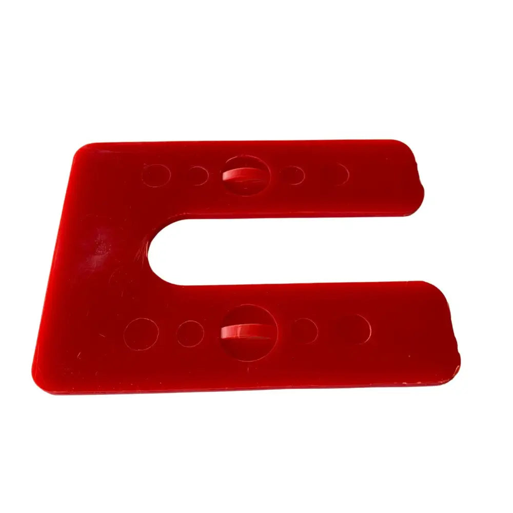 Red plastic glazelock heavy-duty interlocking u shim with circular indentations and central protrusion for secure fitting