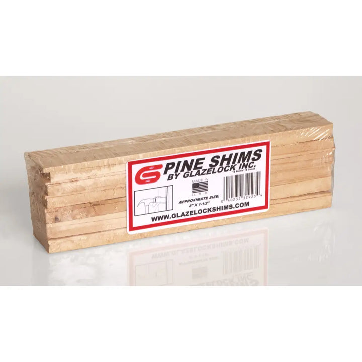 A package of light brown natural pine pre-scored wood shims 8 x 1-1/4 x 3/8 from glazelock shims wrapped in plastic