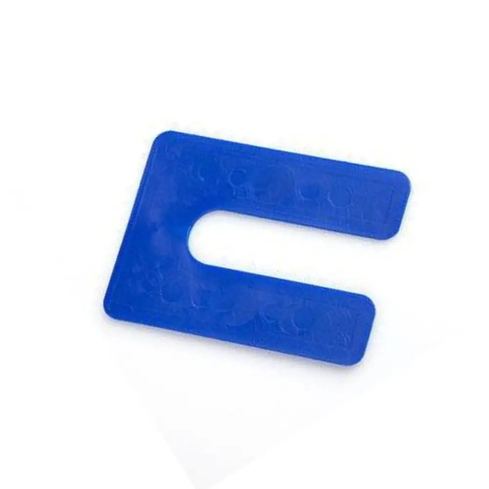 Blue plastic u-shaped glazelock square horseshoe shims with embossed circular patterns and 7/8 inch slot