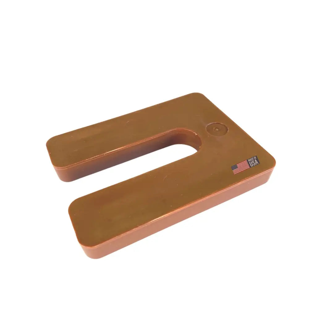 Brown u-shaped plastic glazelock shims with circular indentation and made in usa flag sticker for square horseshoe use