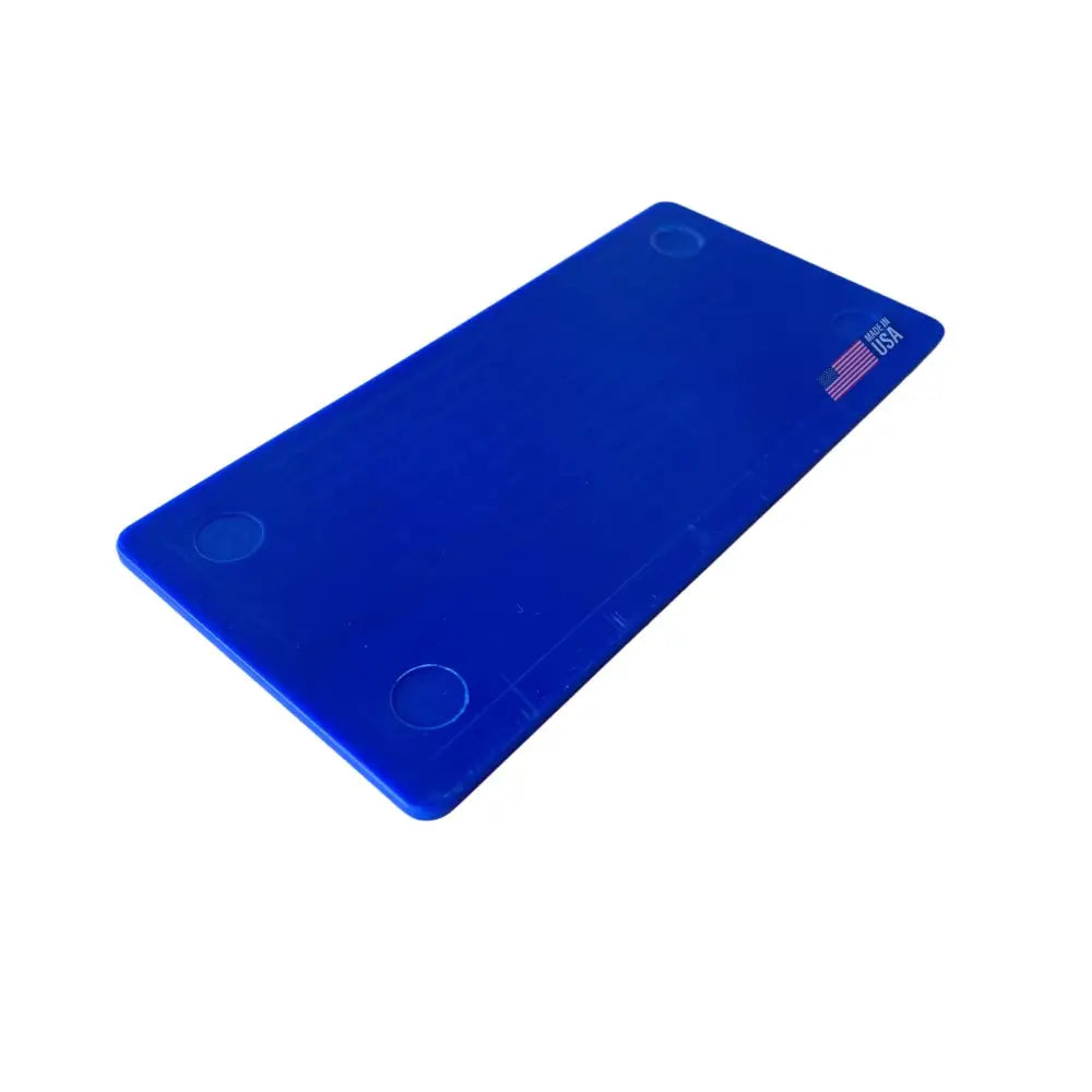 Blue rectangular plastic glazelock shims with three circular indentations and american flag logo for window installation