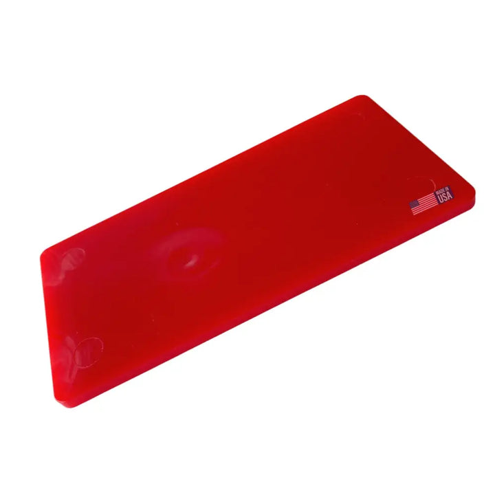 Red rectangular plastic shim with made in usa label and american flag emblem from glazelock shims collection