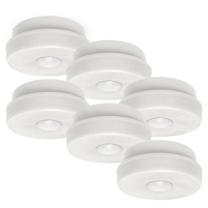 Six white iq america battery powered motion sensor ceiling lights with led emitters and textured surface