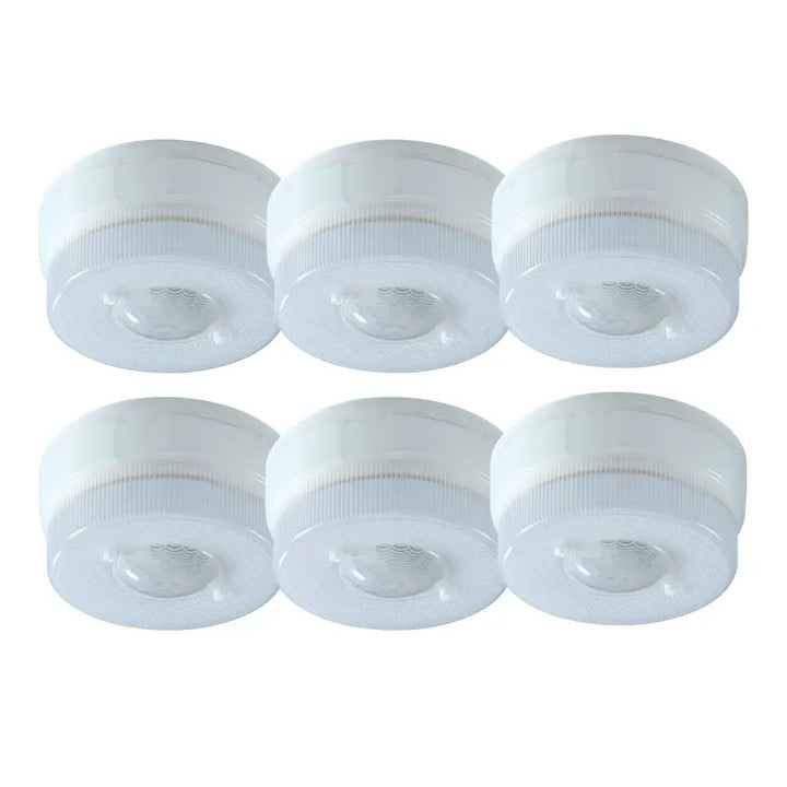 Six translucent white plastic bottle caps with ribbed edges for iq america battery powered motion light ceiling light