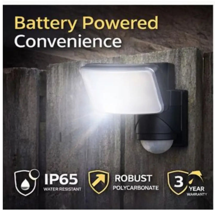 Black battery powered outdoor solar light with frosted diffuser and motion sensor featuring dynamic tracking technology and 5000k cool white