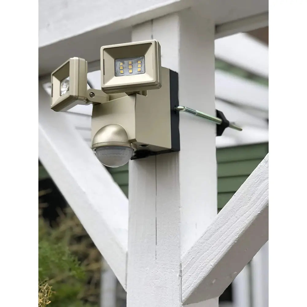 Beige iq america led motion security flood light with dual-head eave mount battery powered motion sensor flood light