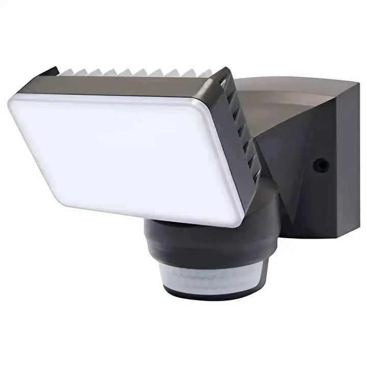 Black and white IQ America LED motion security light with rectangular led panel and textured housing for outdoor security