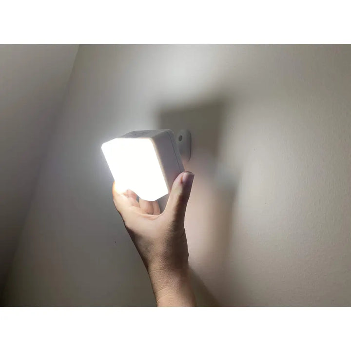 White rectangular led light with sleek modern design for eave mount motion security by IQ America