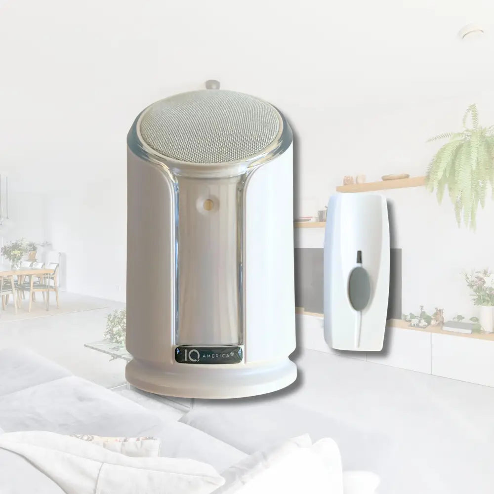 Silver and white iq america air freshener diffuser with mesh top and chrome accents for battery powered wireless use