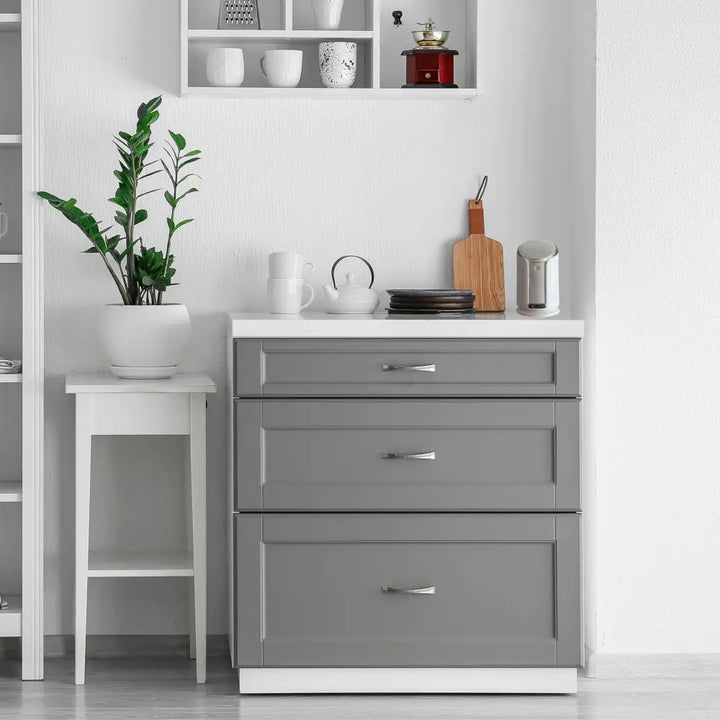 Gray three-drawer cabinet with white base and silver handles shown with iq america battery powered wireless doorbell chime kit