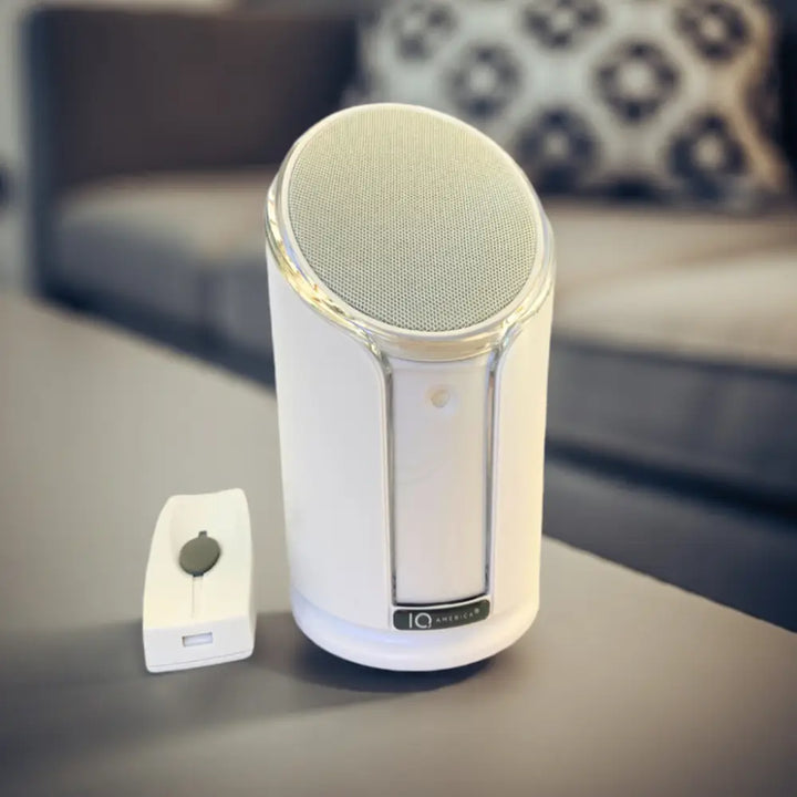 White cylindrical iq america powered wireless doorbell chime with silver mesh grille and chrome trim battery powered wireless