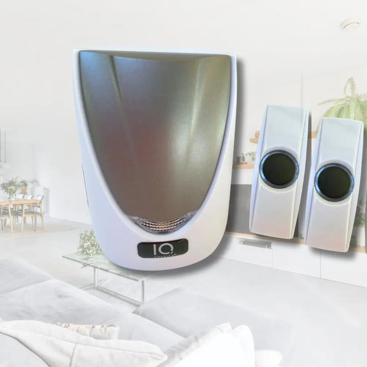 White iq brand wall-mounted hand dryer with sleek curved design and metallic silver interior for wireless portable door chime use