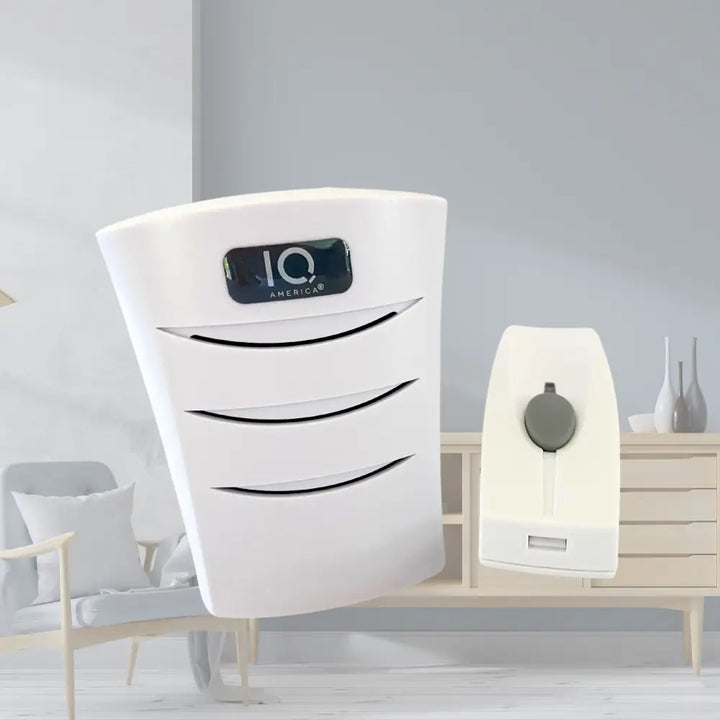 White iq america air purifier with sleek black accent panel featured in a battery powered wireless portable door bell kit