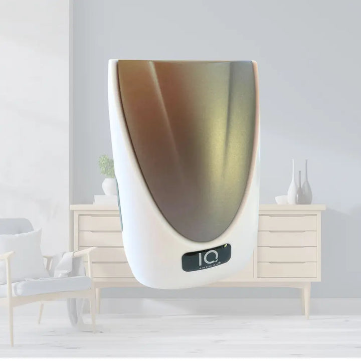 White and gold metallic wall-mounted urinal paired with iq america wireless doorbell chime kit with bell chime tones