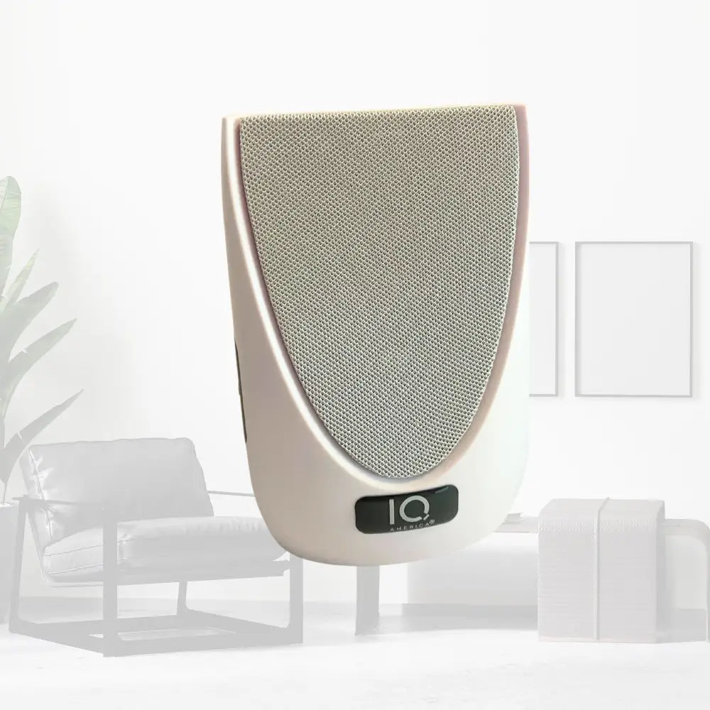 Cream-colored iq audio wireless portable door bell speaker with textured grille and modern battery powered wireless chime design