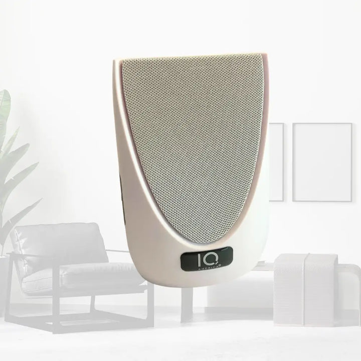 Cream-colored iq audio wireless portable door bell speaker with textured grille and modern battery powered wireless chime design