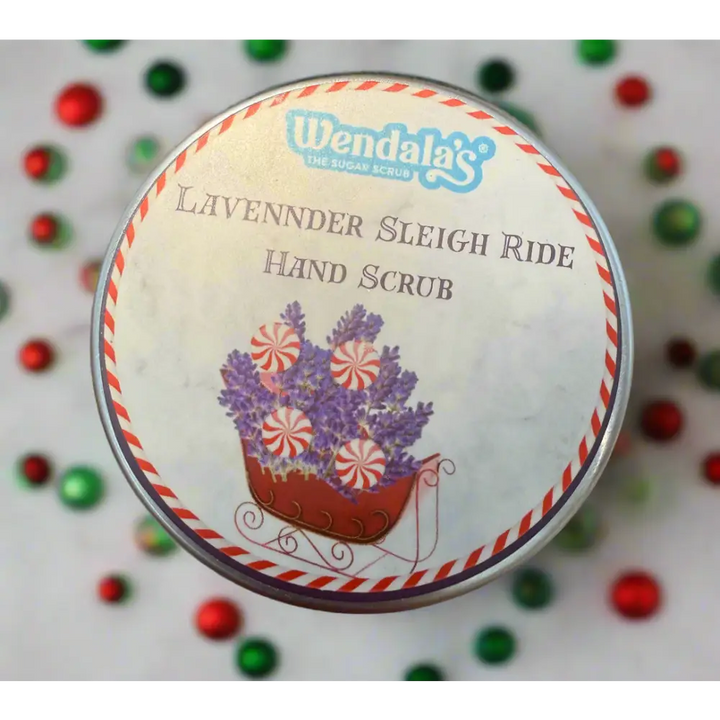 Wendala lavender sleigh ride hand scrub in a festive tin with purple lavender and red white peppermint candies on lid