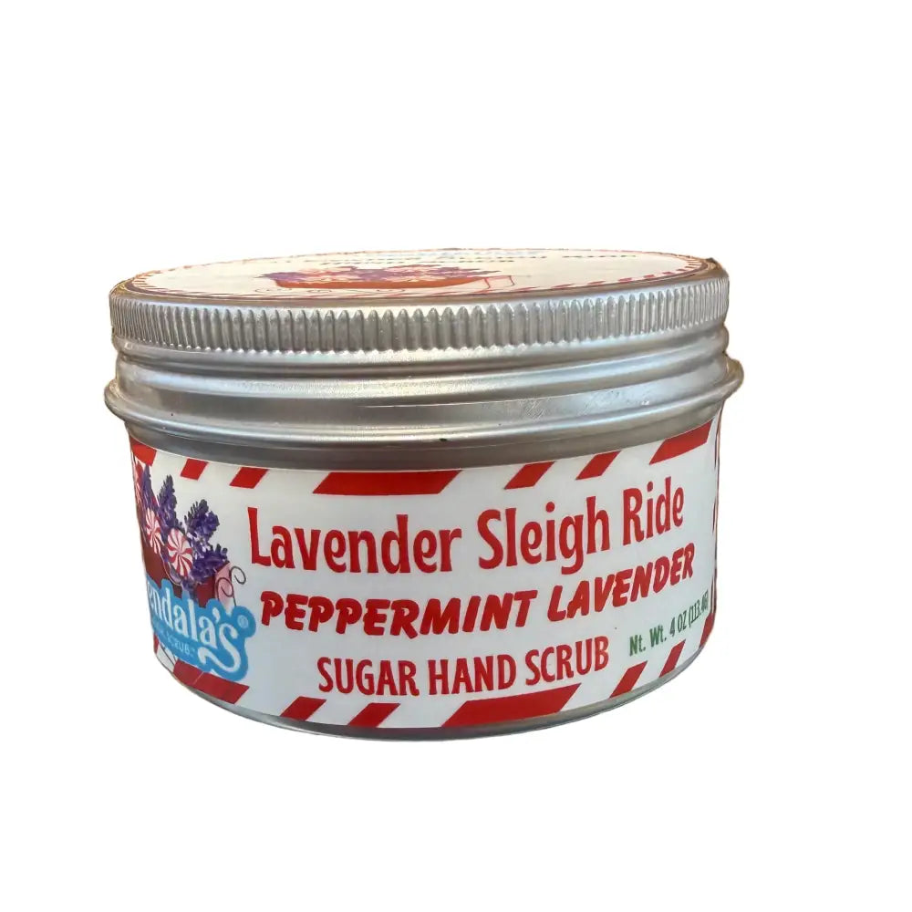 A festive silver tin of mandala’s lavender sleigh ride peppermint lavender sugar hand scrub with red floral label