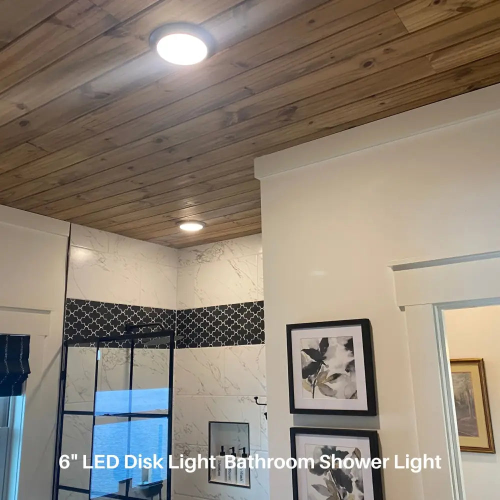 Led flush mount ceiling disk light with bright white 750 lumens mounted on wooden ceiling for new installation or retrofit
