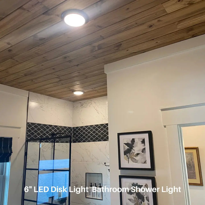 Led flush mount ceiling disk light with bright white 750 lumens mounted on wooden ceiling for new installation or retrofit