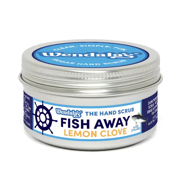 Wendalas lemon clove natural sugar scrub in a silver tin with blue and white labeling for cooking odors and fish smells