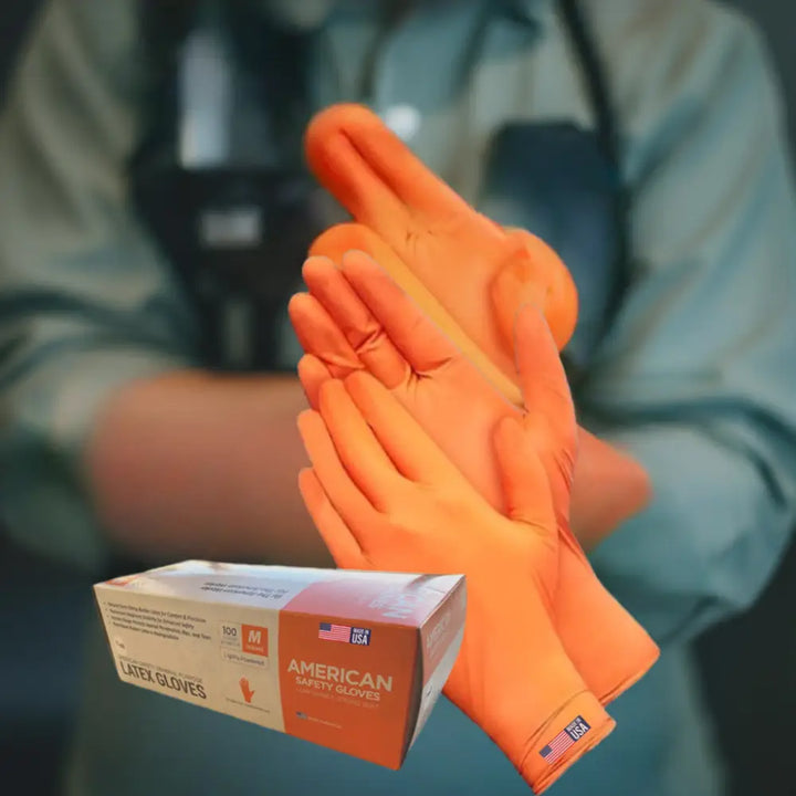 Bright orange natural rubber disposable latex low protein safety gloves with reinforced fingertips in american safety gloves box